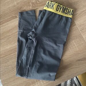 Gymshark Charcoal Leggings with Vibrant Yellow Waistband